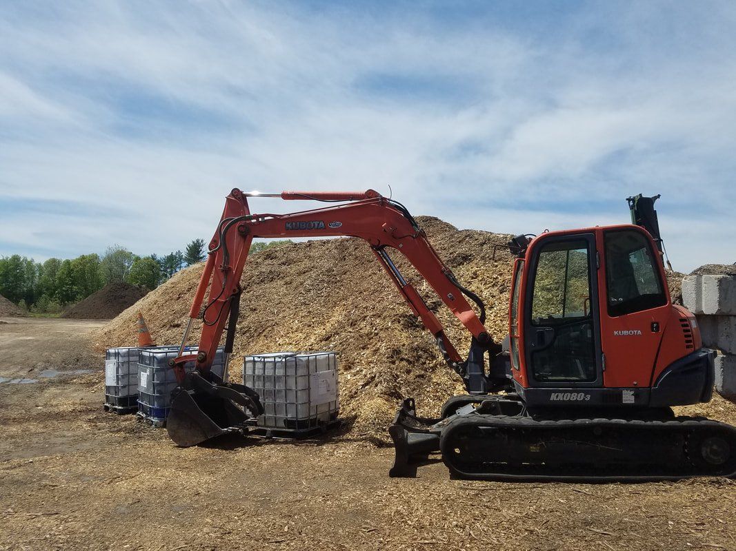 Natural Mulch and Mini Excavator — Monroe Township, NJ — Slammin Canz, Inc.