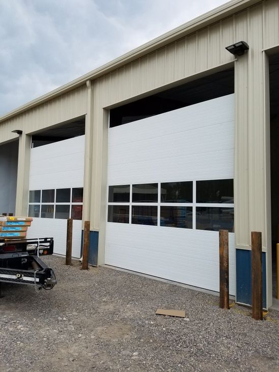 Wood Garage Doors — White Quality Garage Door in Montrose, CO Wood Garage Doors — White Quality Garage Door in Montrose, CO