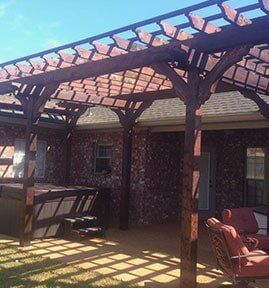 Residential Pergolas —  Beautiful House with Pergola in Pearl, MS