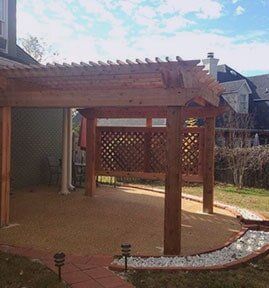 Garden Pergolas — Patio with Brown Pergola in Pearl, MS