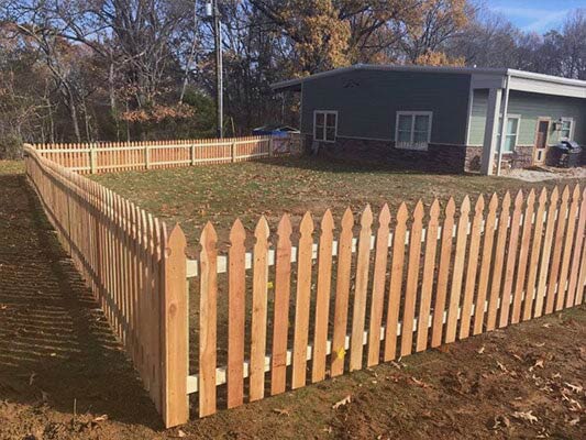 Wood Fence — Residential House with Fence in Pearl, MS