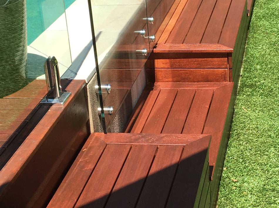 wood around glass pool door