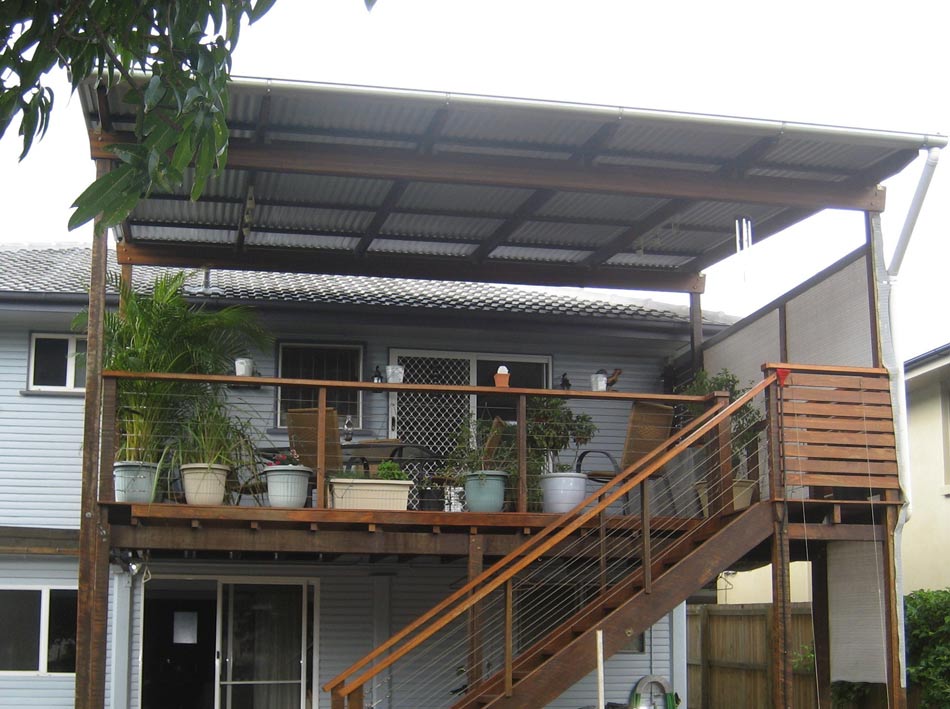 patio with roof and stairs