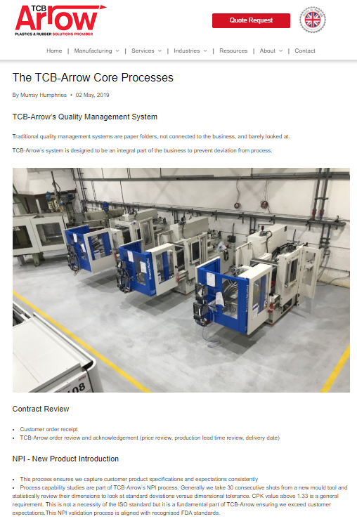 A row of machines are lined up in a factory.