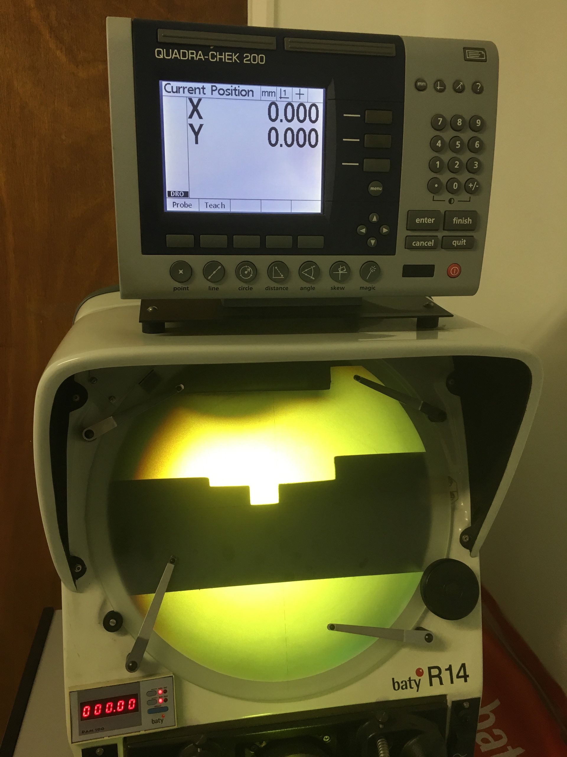 A device with a screen that says x and y on it
