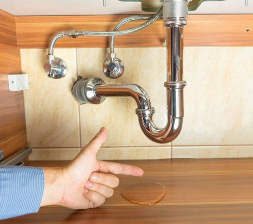 Water Leak Under Drain of Sink — Wimauma, FL — Reedy Plumbing Water Leak Under Drain of Sink — Wimauma, FL — Reedy Plumbing