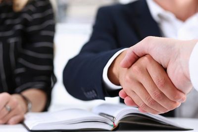 Taxes — Client Shake Hands with the Bookkeeper in Skokie, IL