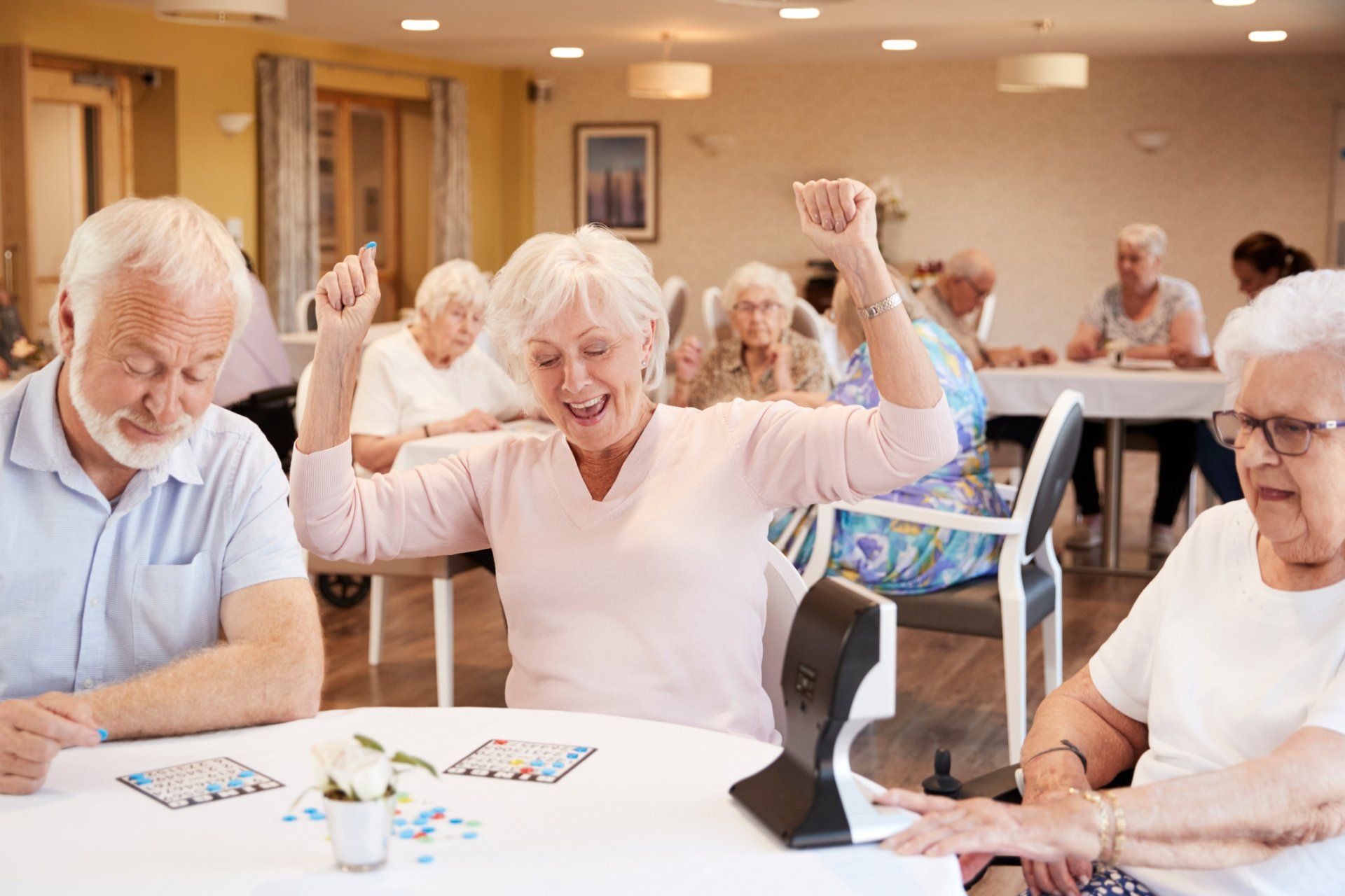 Group Of Elderly Playing Bingo — Billings, MT — TLC Assisted Living