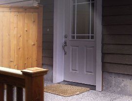White Door with Brown Mat