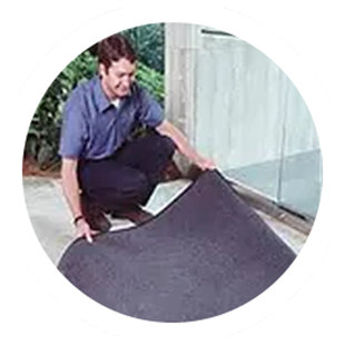 man fixing mat