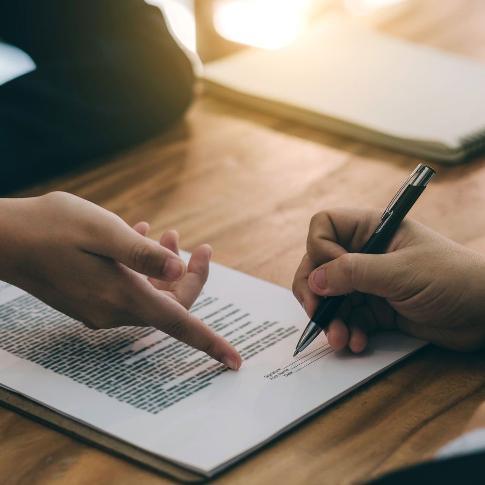 Signing a Contract — Utica, NY — Hage & Hage LLC Signing a Contract — Utica, NY — Hage & Hage LLC