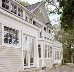 White House With Vinyl Siding — Powells Point, NC — Coastal Roofing & Siding Inc