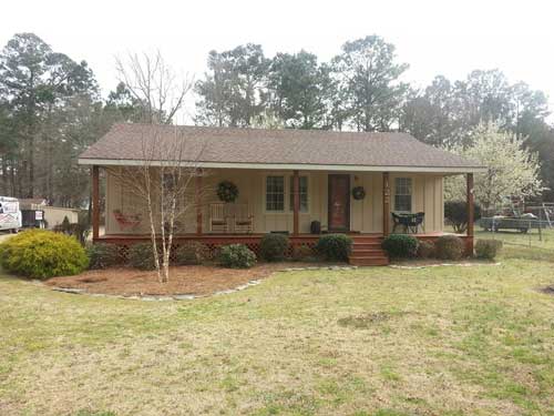 House Exterior With Shrubs — Powells Point, NC — Coastal Roofing & Siding Inc