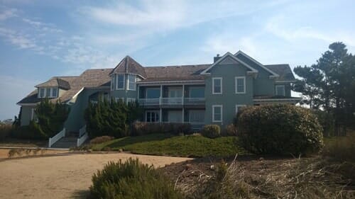 Modern House With Asphalt Roof Shingles — Powells Point, NC — Coastal Roofing & Siding Inc