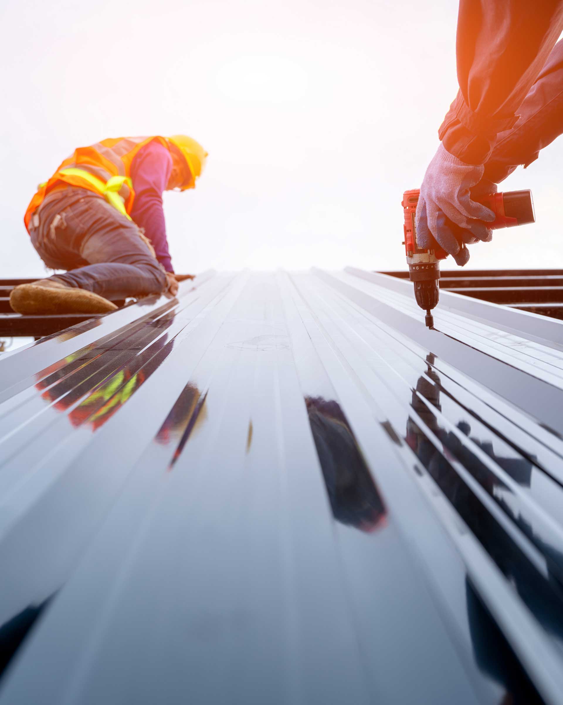 Modern House Roof Worker — Powells Point, NC — Coastal Roofing & Siding Inc Modern House Roof Worker — Powells Point, NC — Coastal Roofing & Siding Inc