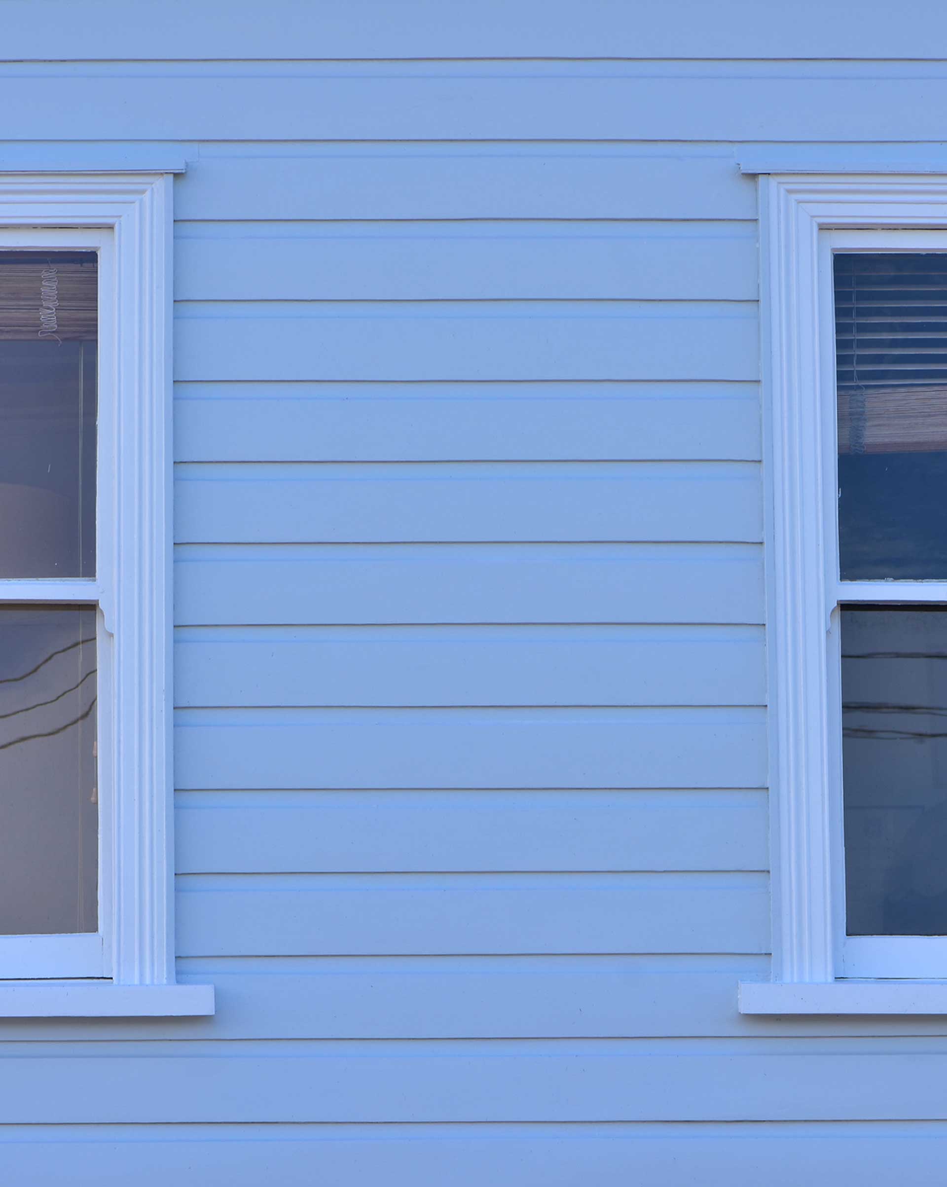 Blue Wooden Wall Siding — Powells Point, NC — Coastal Roofing & Siding Inc Blue Wooden Wall Siding — Powells Point, NC — Coastal Roofing & Siding Inc