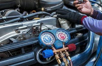 Mechanic Checking the Air Pressure — Indianapolis, IN — Mr. Radiator