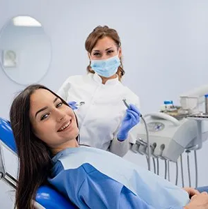Dentist with Her Patient — Westlake, OH — Aico’s Dental Group Dentist with Her Patient — Westlake, OH — Aico’s Dental Group