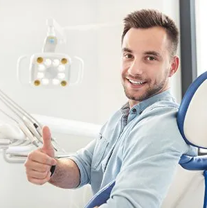 Dental Patient Doing Thumbs Up — Westlake, OH — Aico’s Dental Group Dental Patient Doing Thumbs Up — Westlake, OH — Aico’s Dental Group
