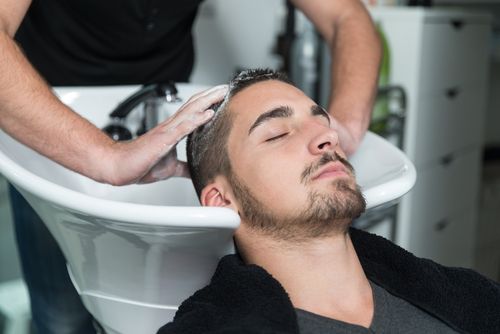 Man getting a haircut at our traditional barber shop in Portadown