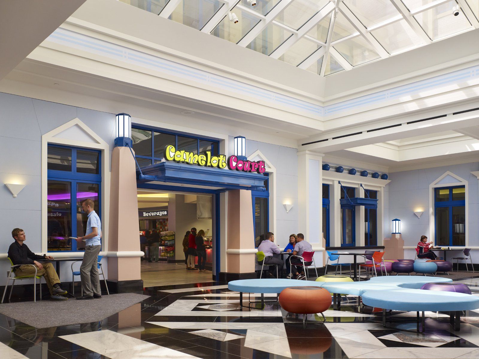 People in a mall atrium with the 