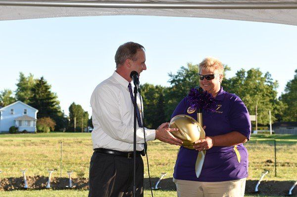 Bill Schurman, P.E. Partner of Hammond Construction, shown at the PK-8 groundbreaking ceremony with Champion Middle School Principal Heather Campbell.