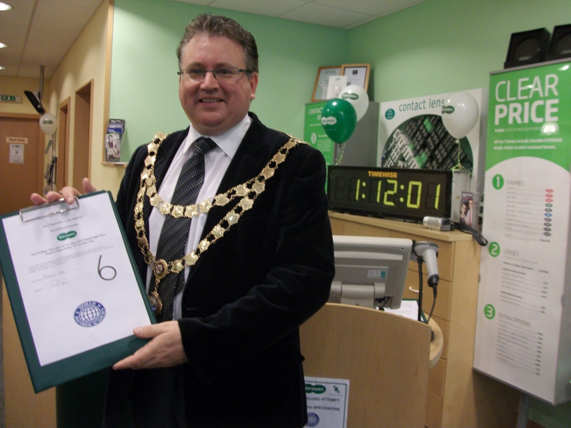 Mayor David Cox being patient No. 6 of the World's Longest Day at the Optician. Photo by Mary Chapman.