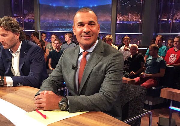 Ruud sitting at a desk