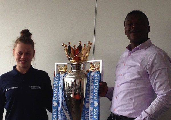 marcel posing next to a crowned cup