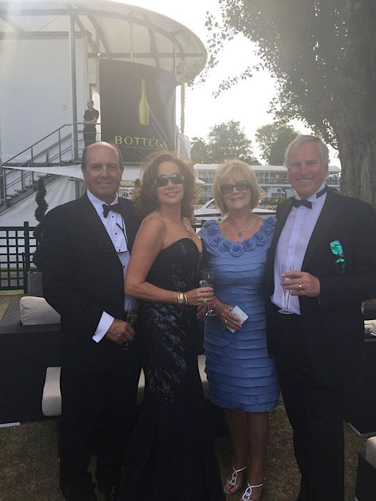 corrinne with her friends at an exclusive event