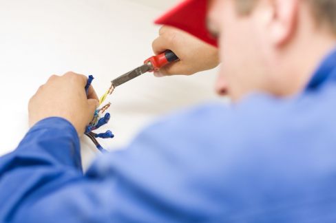 One of the team carrying out electrical work