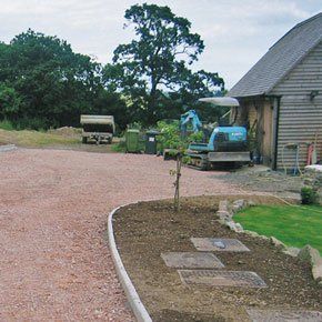 Landscape gardens - Exeter, Devon - D J Trinder Groundworks - Digger