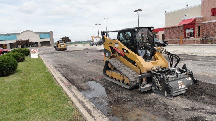 Construction Equipment Placing Asphalt — East Peoria, IL — Tazewell County Asphalt Company