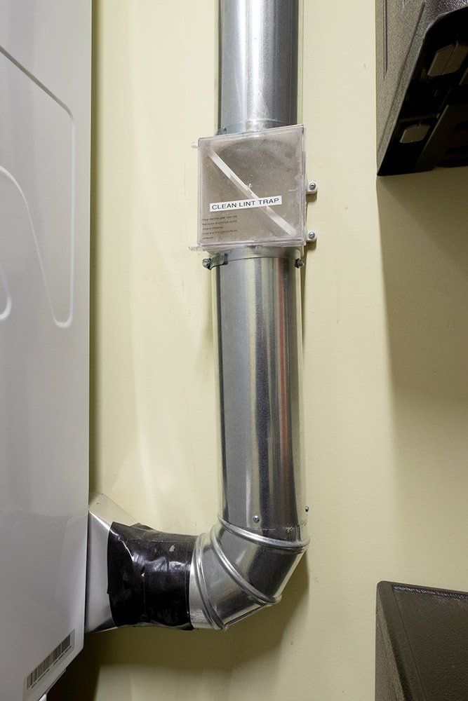 dryer vent in laundry room of Ada home