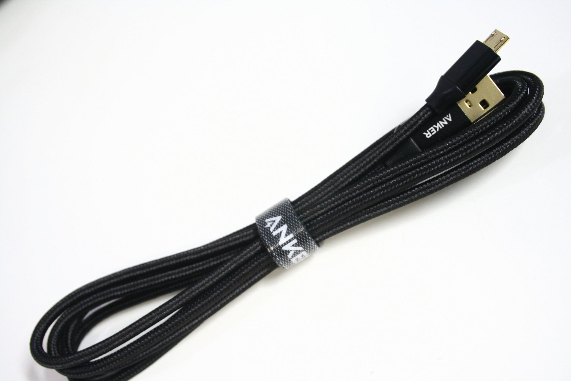 A black cable with a label that says anker on it