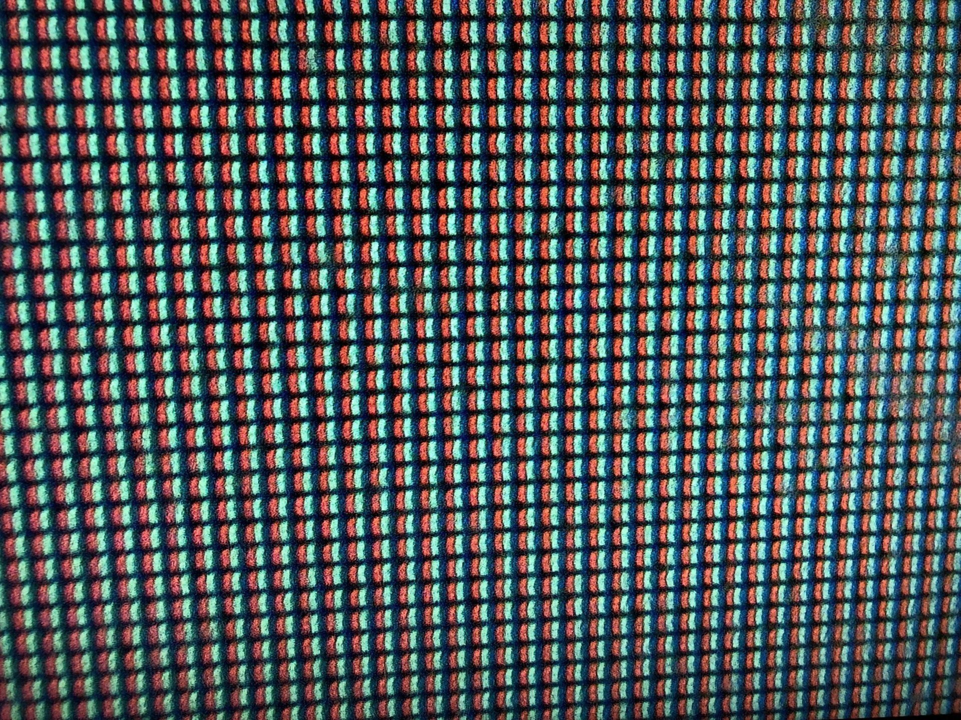 A close up of a screen with a grid pattern showing pixels.