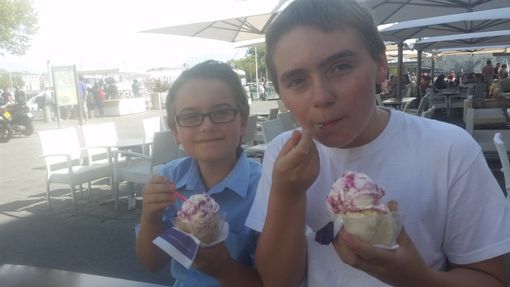Two boys eating ice cream in La Rochelle
