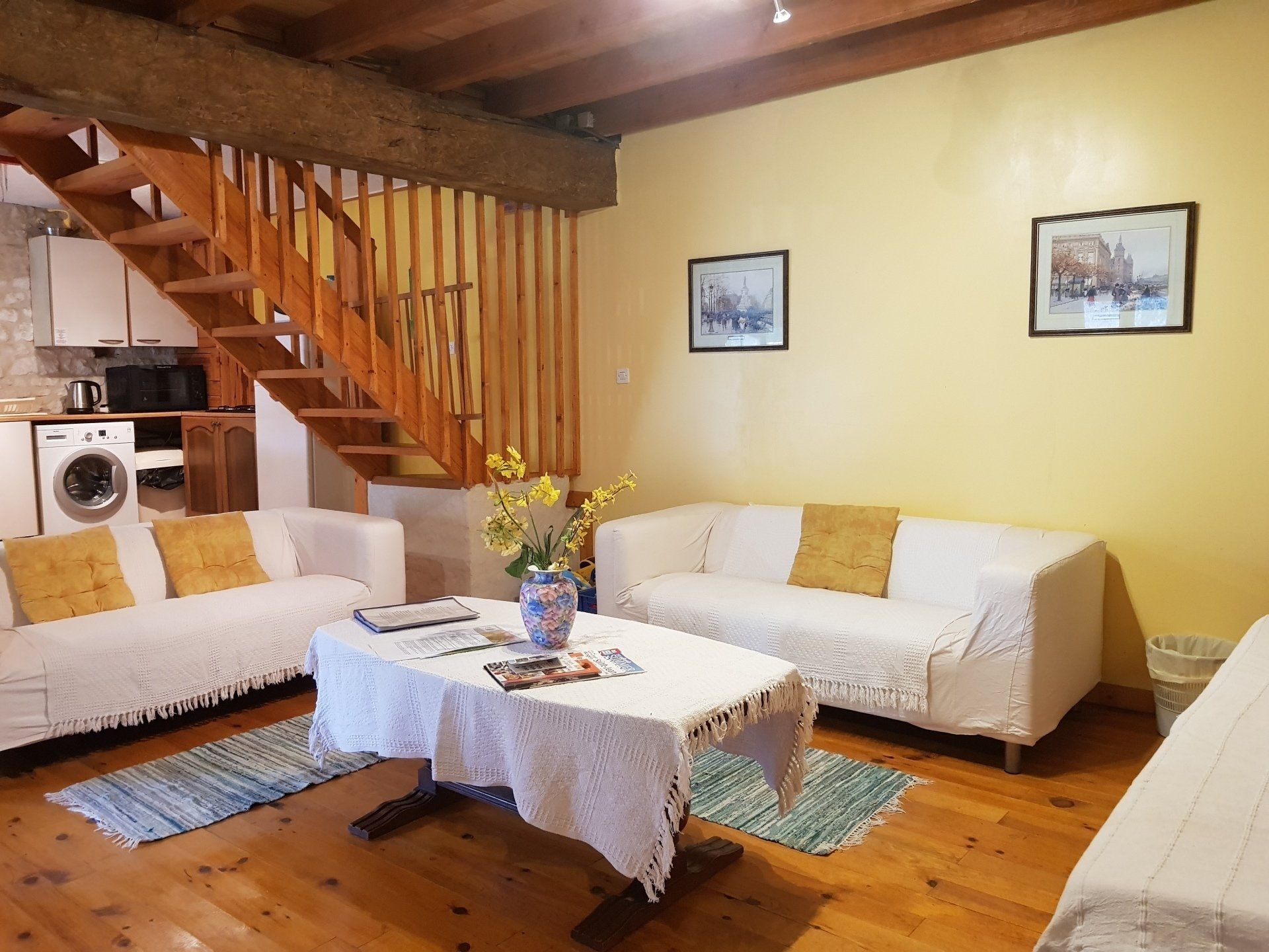 ikea cream sofas with yellow cushions