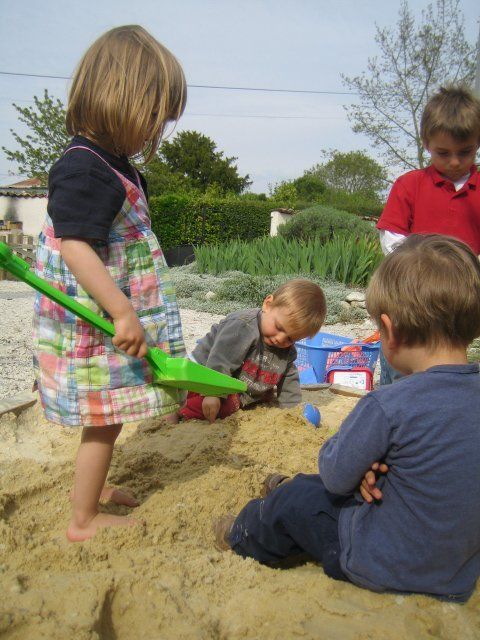 children playing in a sandpit