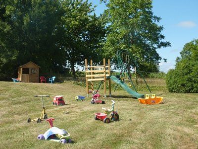 garden filled with childrens toys