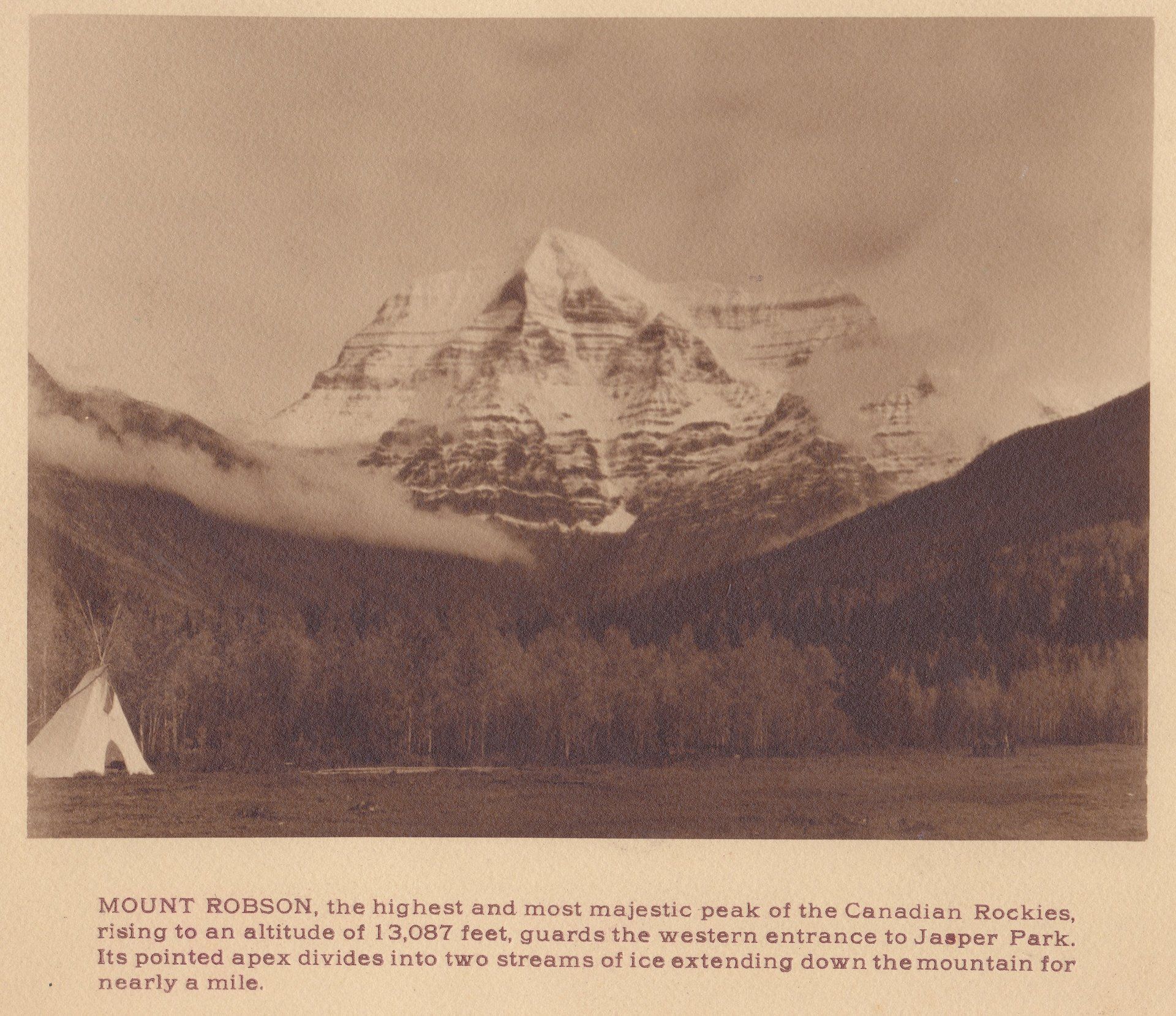 MOUNT ROBSON, the highest and most majestic peak of the Canadian Rockies, rising to an altitude of 13,087 feet, guards the western entrance to Jasper Park. Its pointed apex divides into two streams of ice extending down the mountain for nearly a mile.