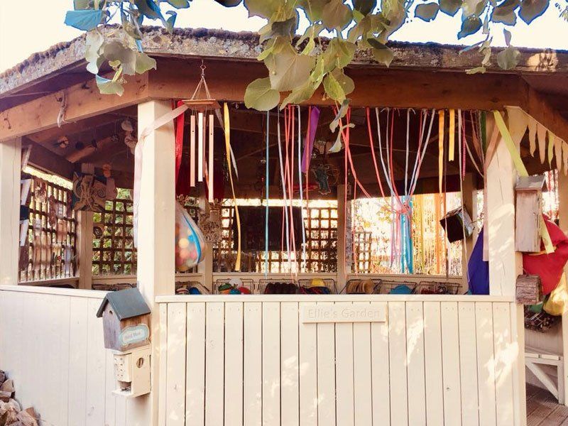 A wooden outdoor play house