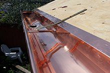 Seamless — Crimson Painted Gutter in Durham, CA