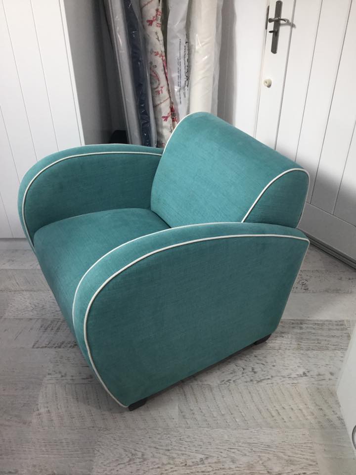 blue upholstered armchair
