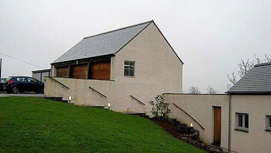 Outbuilding with steps up from the main home