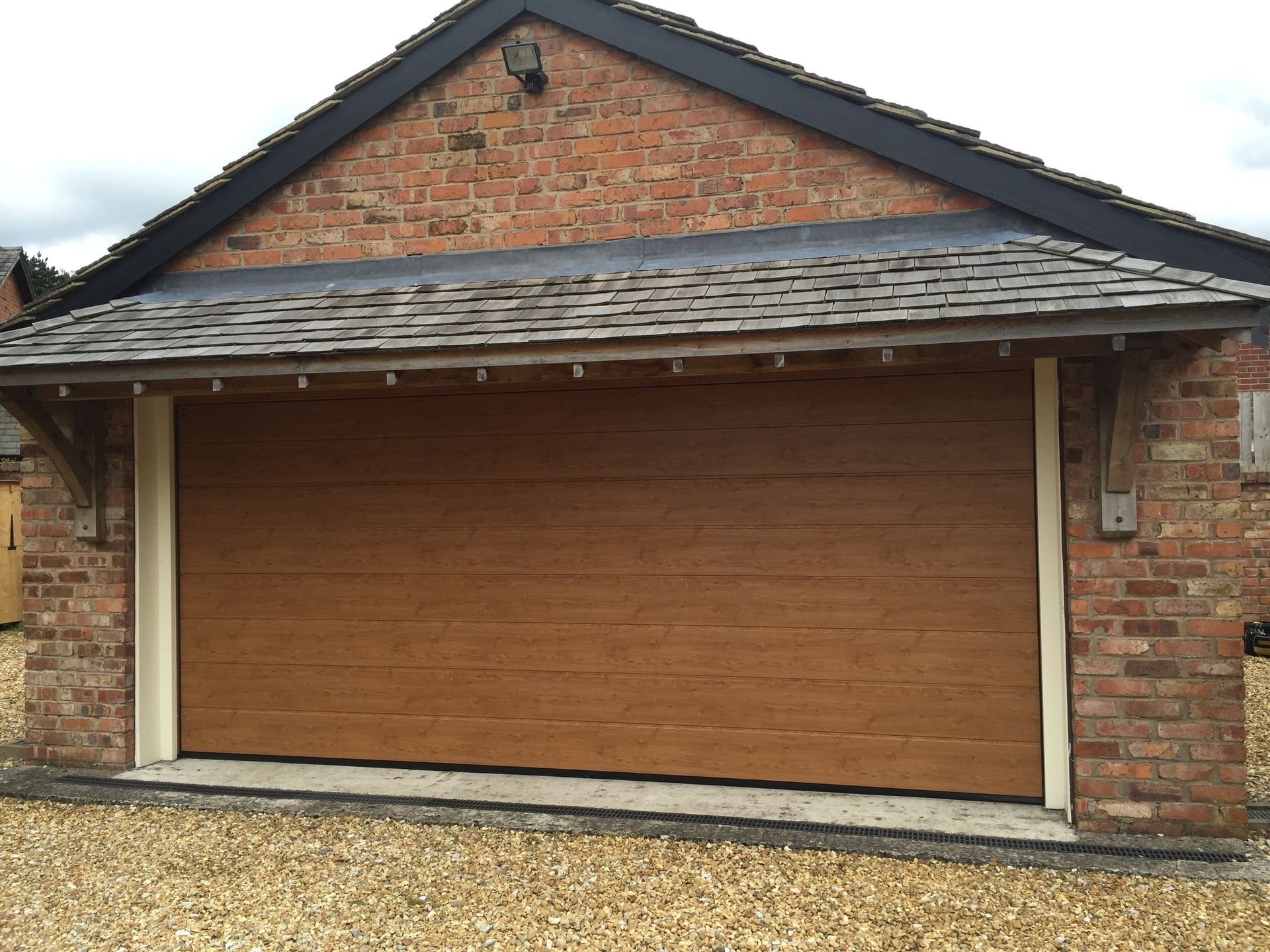 Sectional garage doors
