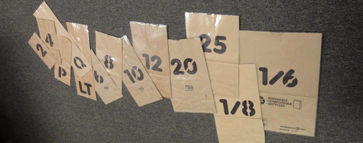 A bunch of pieces of paper with numbers on them