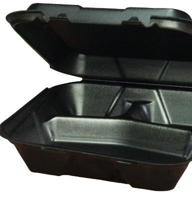 A black styrofoam container with the lid open