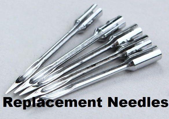A bunch of replacement needles on a table