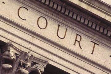 court inscription on building